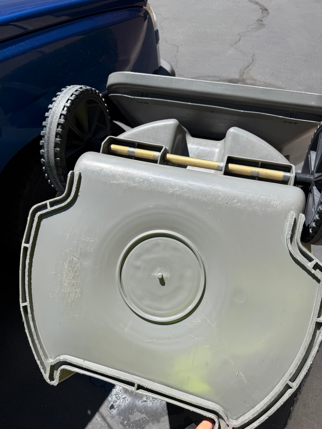 After: clean trash bin wheels and axle